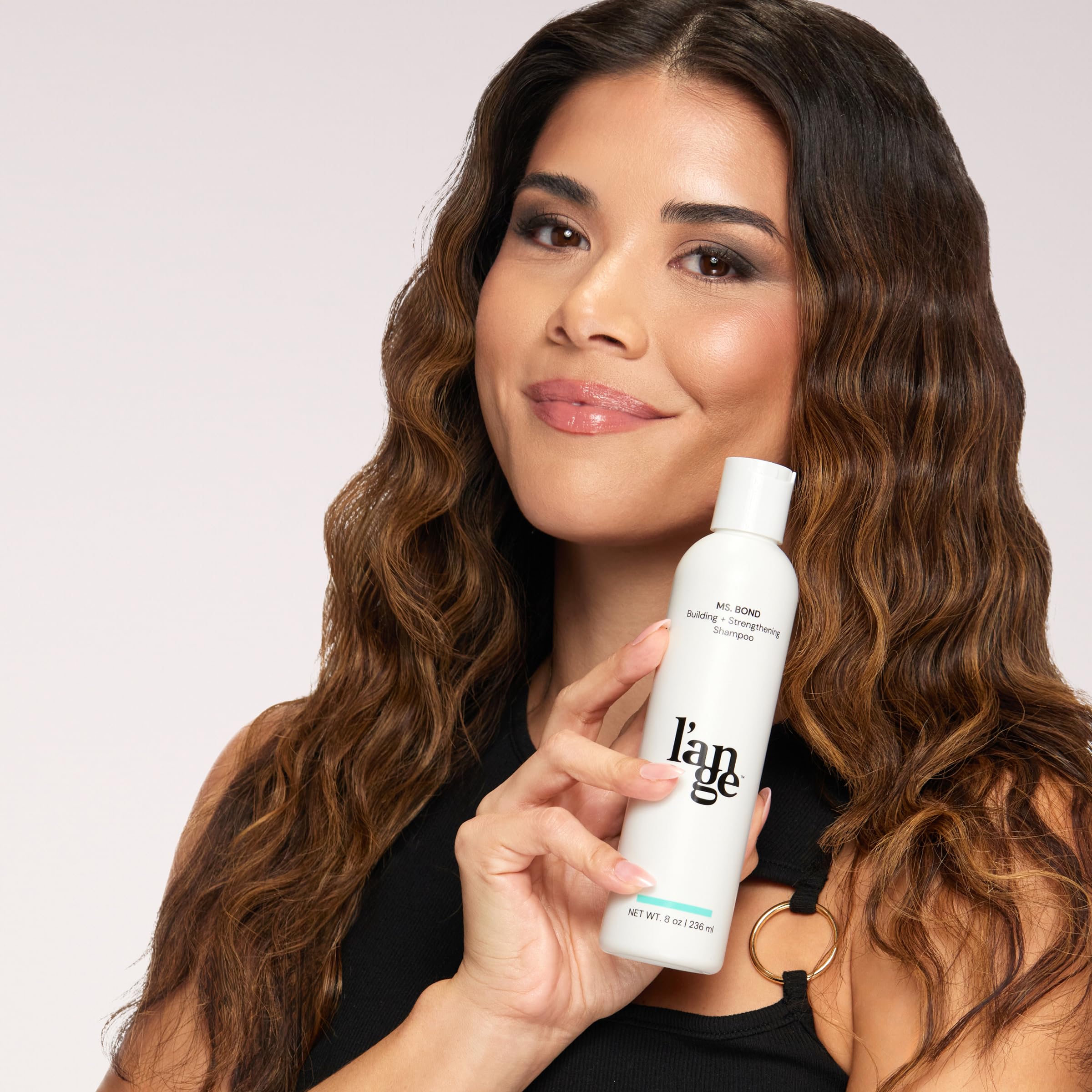Langehair travel 8oz bottle ready for on-the-go routines.