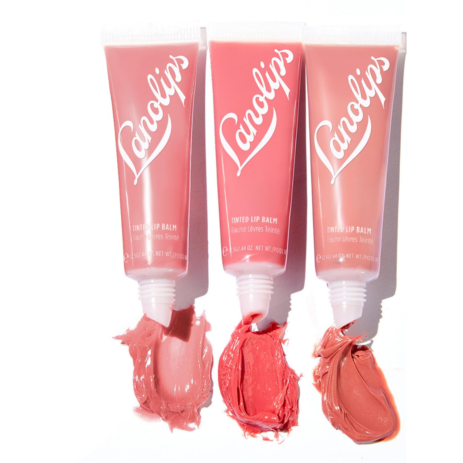 Lanolips Essentials Lip Tint Rose swatch adds a subtle healthy glow and hydration.