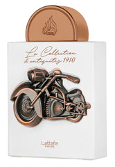 Lattafa 1910 packaging closeup, premium craftsmanship and lasting gourmand notes