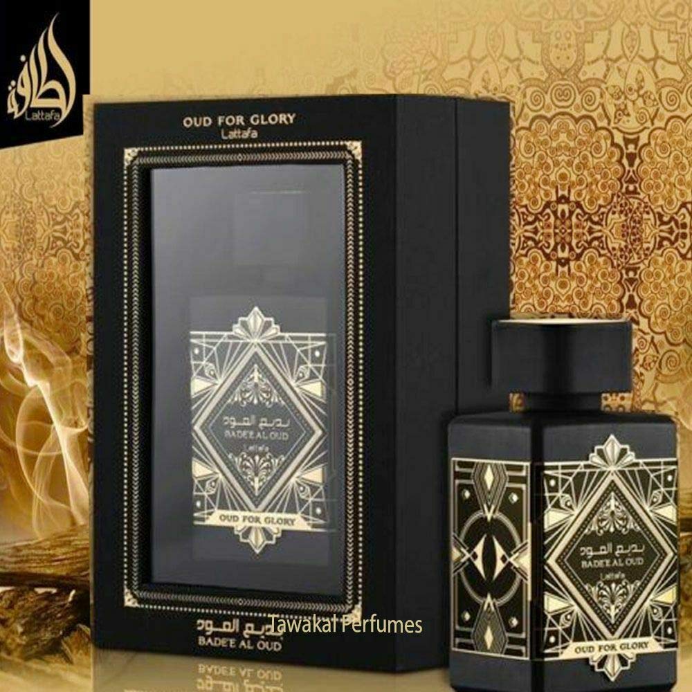 Lattafa Bade’e Al Oud Oud for Glory amber liquid shimmer evokes warm, inviting evening aura.