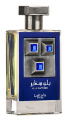 Lattafa Blue Sapphire spray bottle in action for year-round wear with a warm, spicy aura.