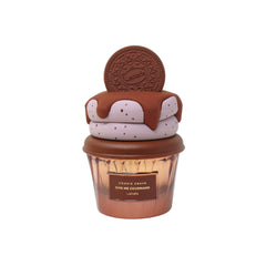 Lattafa Cookie Crave bottle closeup highlights cocoa butter and vanilla notes for scent profile.