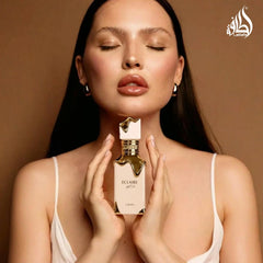 Lattafa Eclaire base notes vanilla praline musk delivering lasting warmth