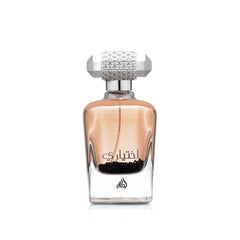 Lattafa Ekhtiari bottle-pour showcases creamy scent ideal for daytime elegance.