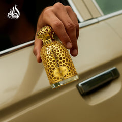 Lattafa Emeer spray action captures smooth even application for all day scent