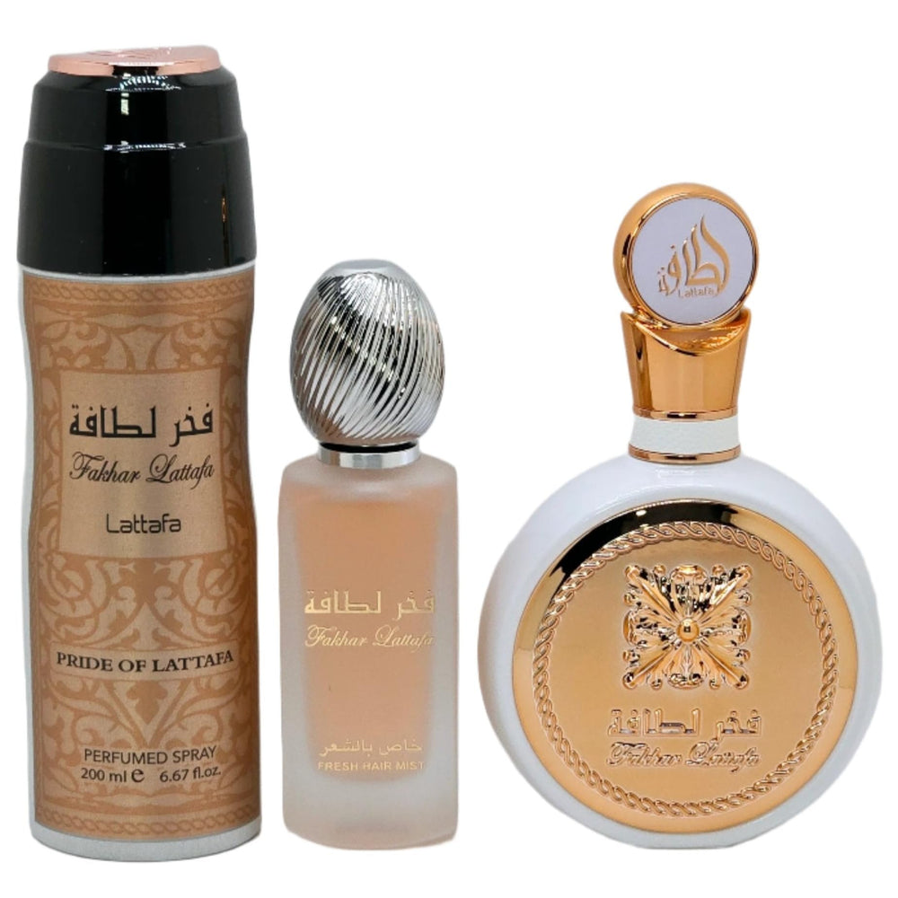 Lattafa Fakhar for Women hair mist being sprayed for refreshed scent.