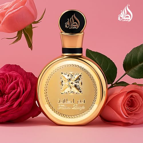 Lattafa Fakhar Gold Extrait splash on skin hints at warm amber-woody notes.