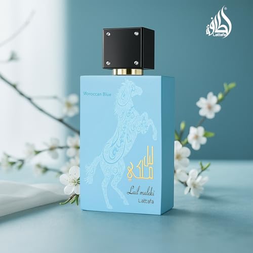 Lattafa Lail Maleki Moroccan Blue spray on wrist for long-lasting wear.