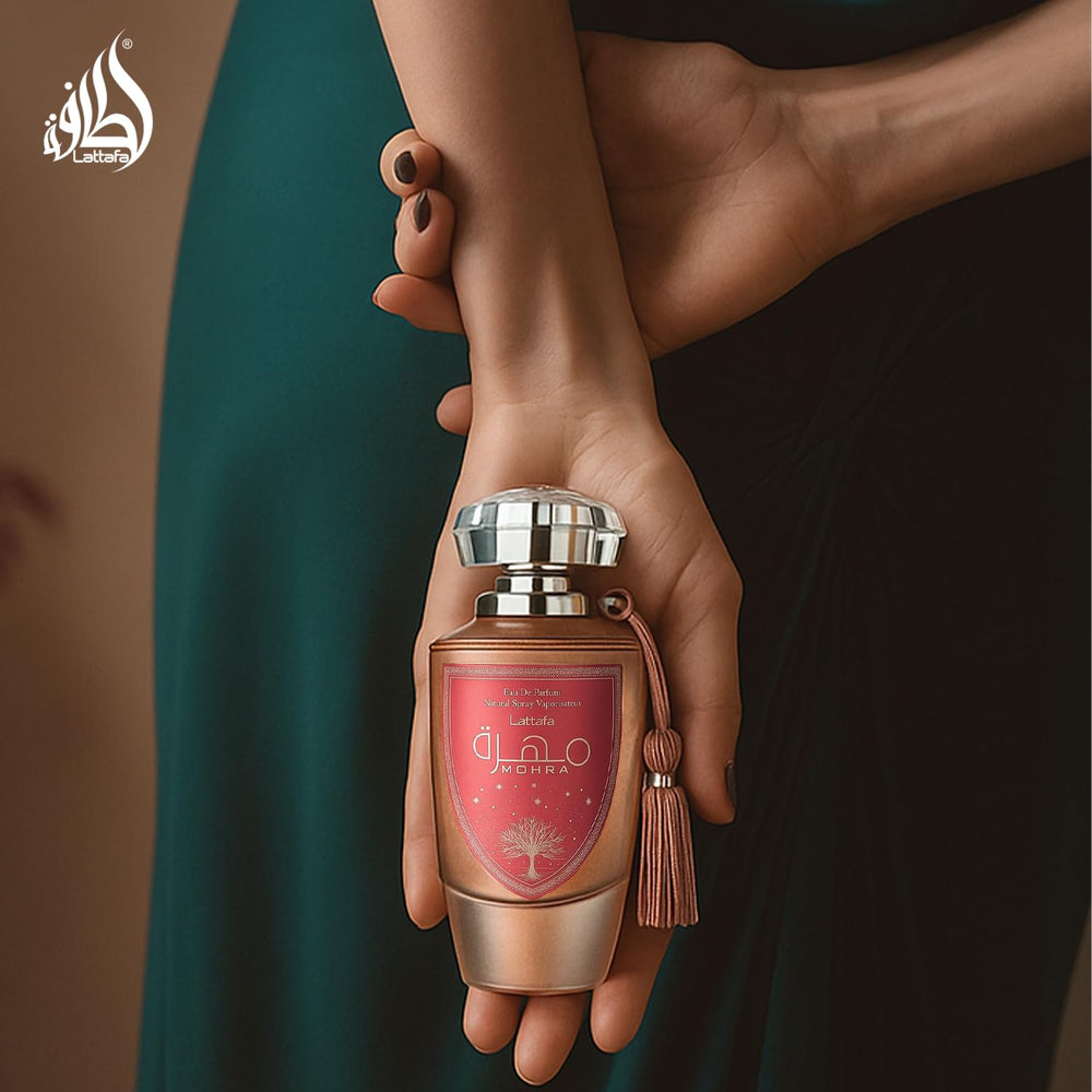 Lattafa Mohra Silky Rose top notes of rose and litchi awaken daytime energy