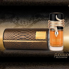 Lattafa Musamam side-view bottle shows sleek silhouette for travel.