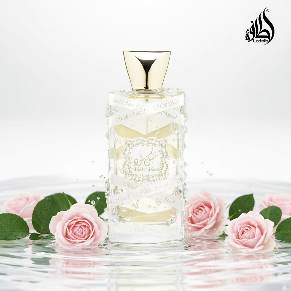 Lattafa Musk Mood top-note visual emphasizes citrus and fruit freshness.