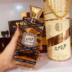 Lattafa Oud Mood heart notes image emphasizes amber and resins for warmth.