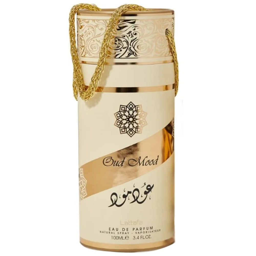 Lattafa Oud Mood vanilla-sandalwood scene hints at creamy base and longevity.