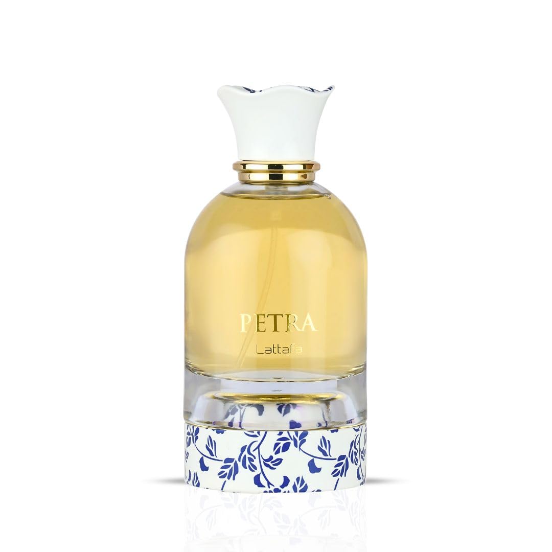 Lattafa Petra EDP liquid close-up reveals rich plum and vanilla notes