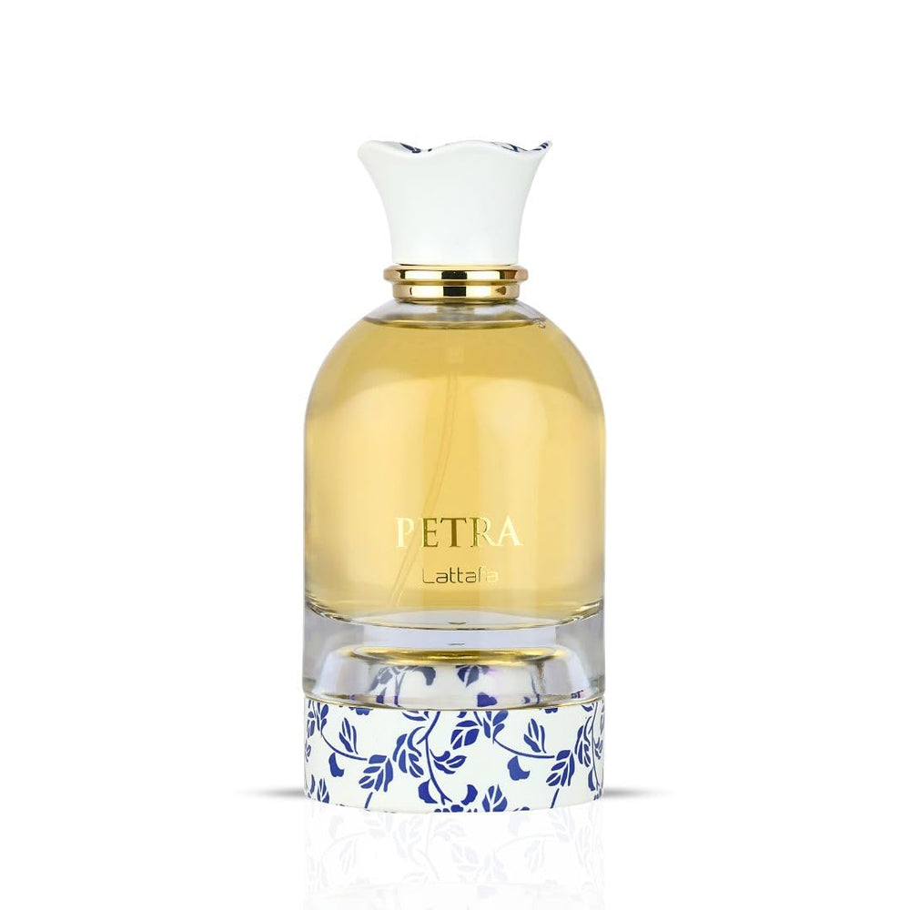 Lattafa Petra EDP liquid close-up reveals rich plum and vanilla notes