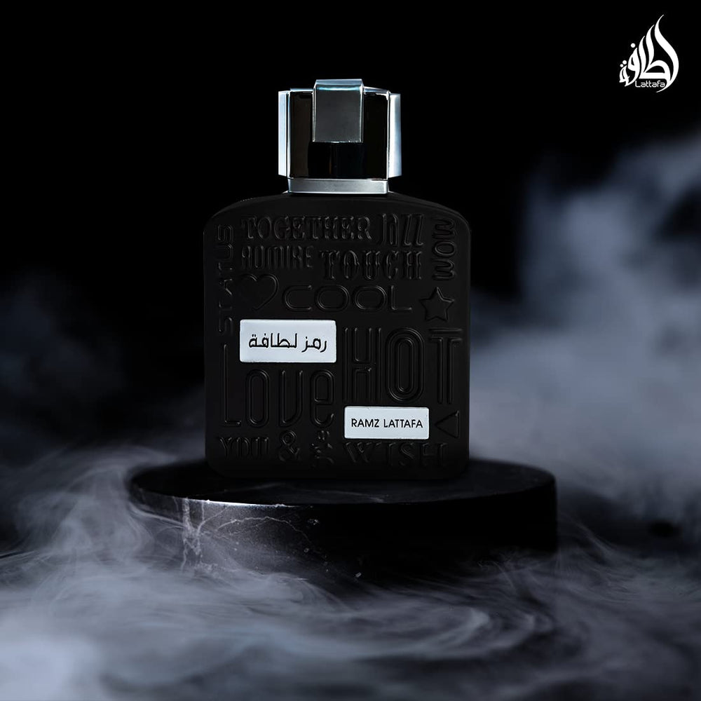 Lattafa Ramz Silver cap close-up, premium packaging signaling luxury.