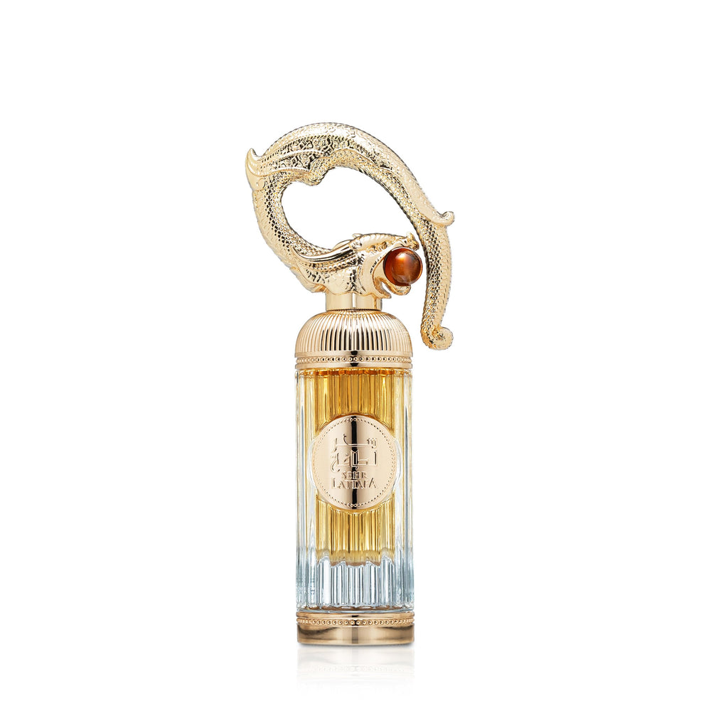 Lattafa Sehr bottle top view evokes cozy evenings with warm cinnamon and almond.