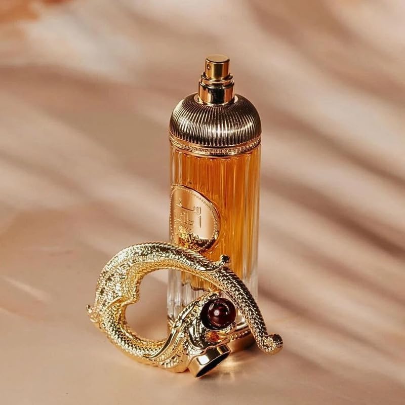 Lattafa Sehr spice image hints cinnamon and almond warmth for cozy mornings.