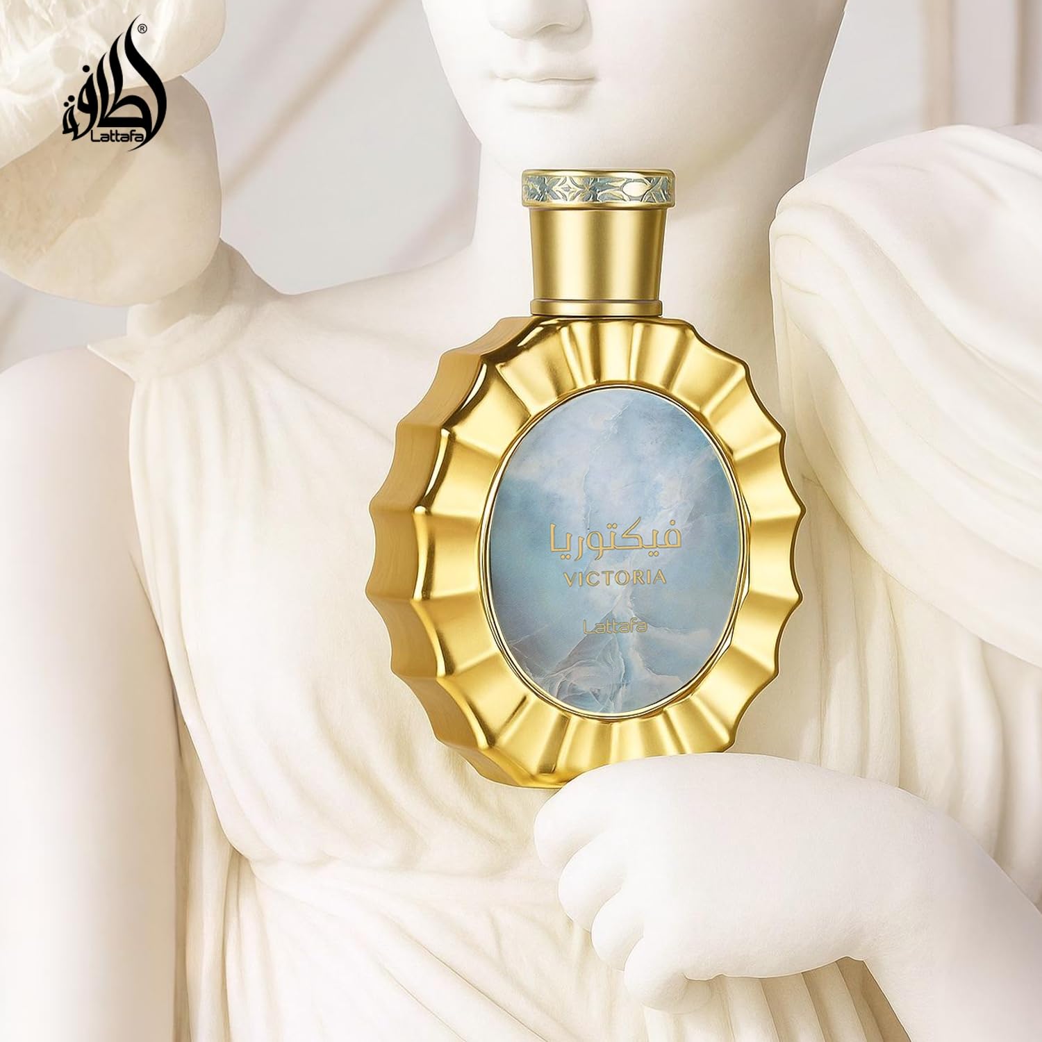 Lattafa Victoria spray mist for quick refresh during busy days.