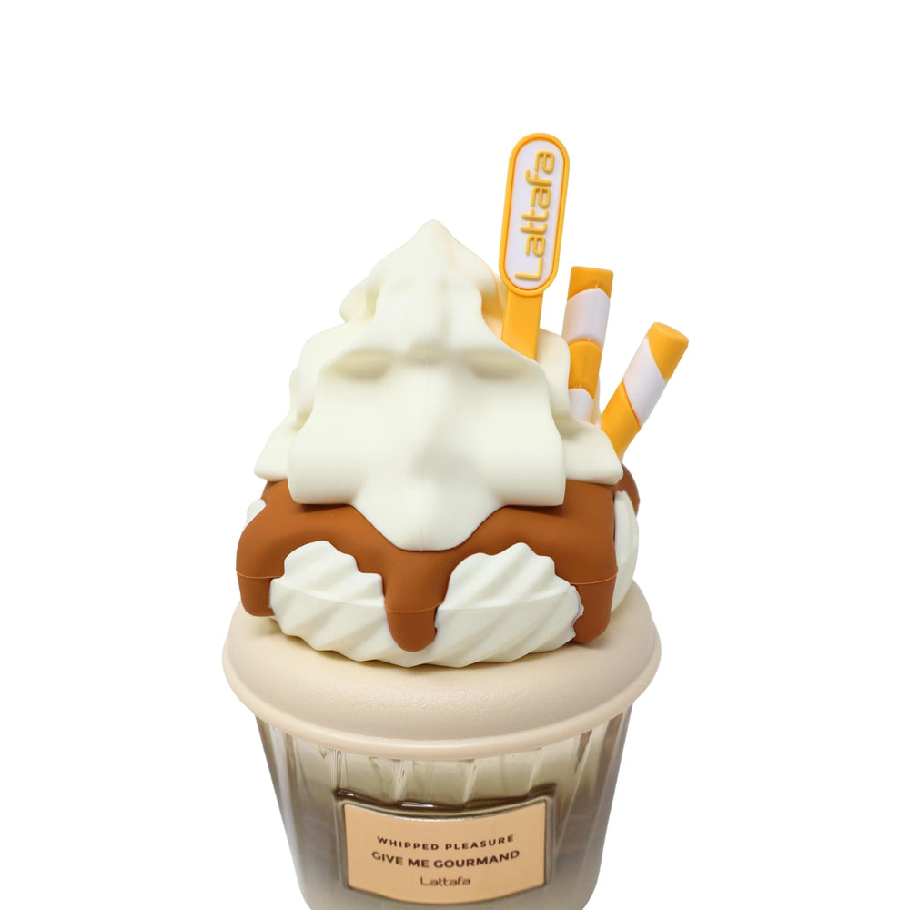 Lattafa Whipped Pleasure vanilla caramel hues image evokes a dessert-inspired fragrance for everyday wear