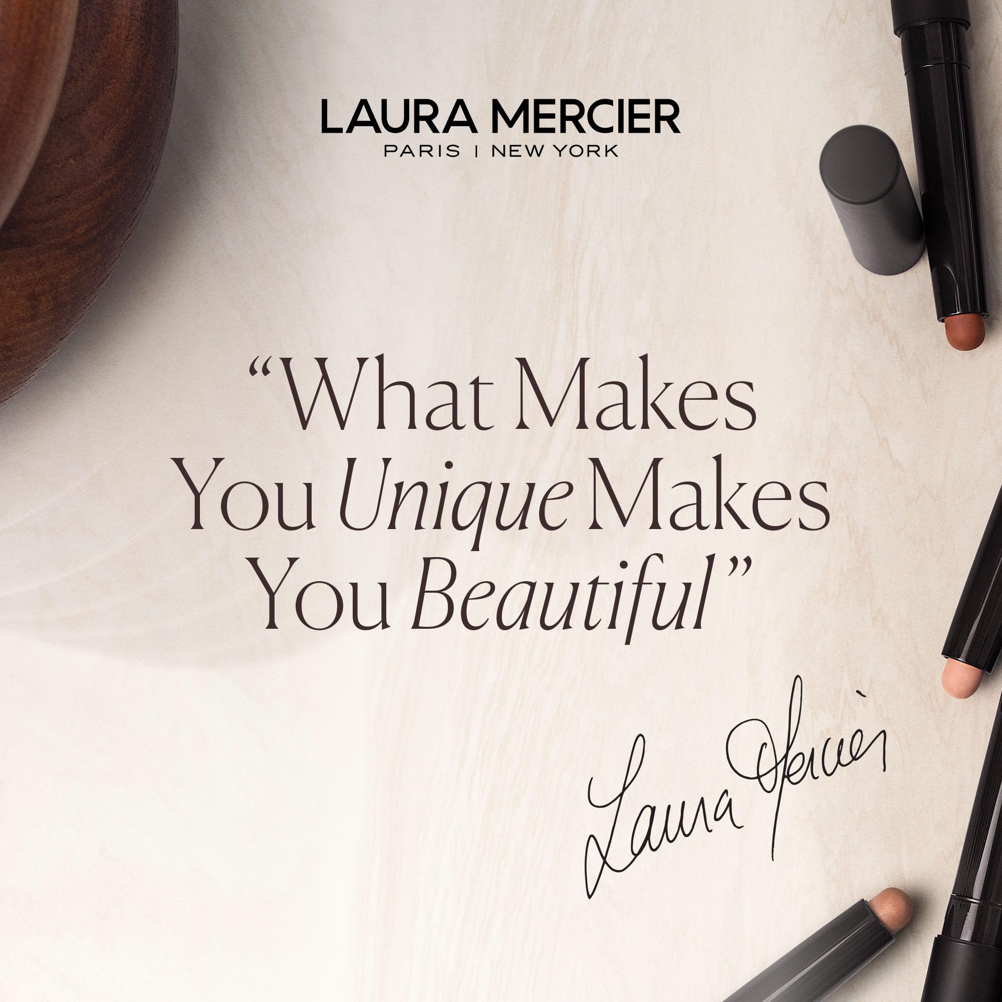 Laura Mercier Real Flawless Foundation Brush application on cheek shows even tone.