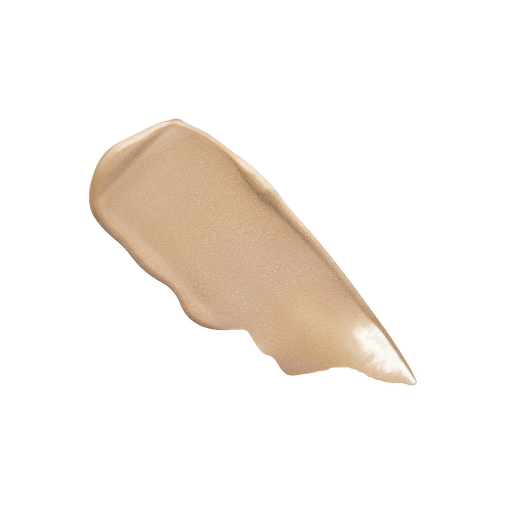 Laura Mercier Tinted Moisturizer Light Revealer nude shade visible under natural light for shade-matched coverage.