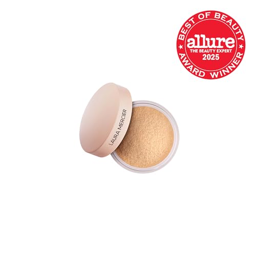 Laura Mercier translucent loose powder application with brush; demonstrating easy, seamless blending.