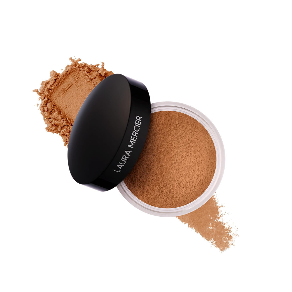 Laura Mercier translucent loose powder jar offers a soft matte finish with long wear.