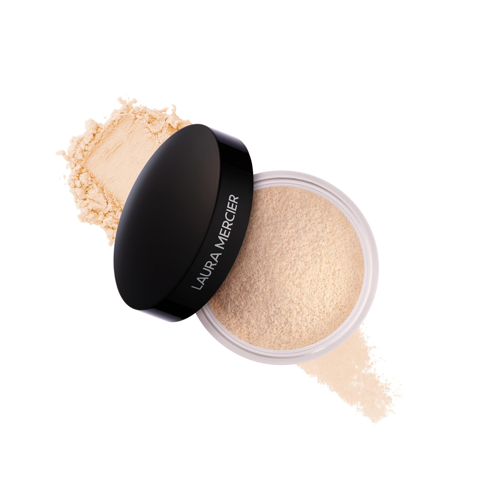 Laura Mercier Translucent Loose Setting Powder compact closeup shows silky texture for long-lasting hold.