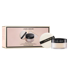 Laura Mercier translucent loose setting powder packaging with limited-edition design for an elevated base.