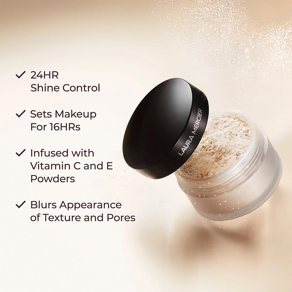 Laura Mercier powder swatch shows true translucency blending with diverse skin tones.