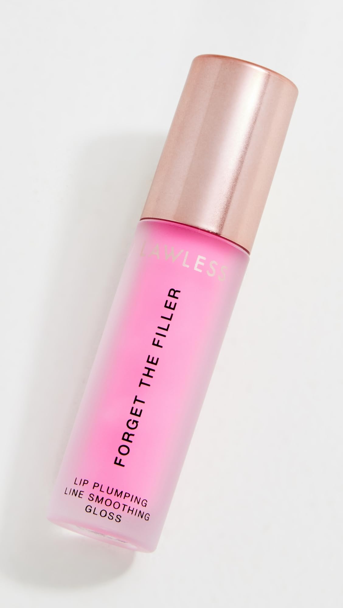 Lawless Forget the Filler Daisy Pink gloss on lips for instant shine and fullness