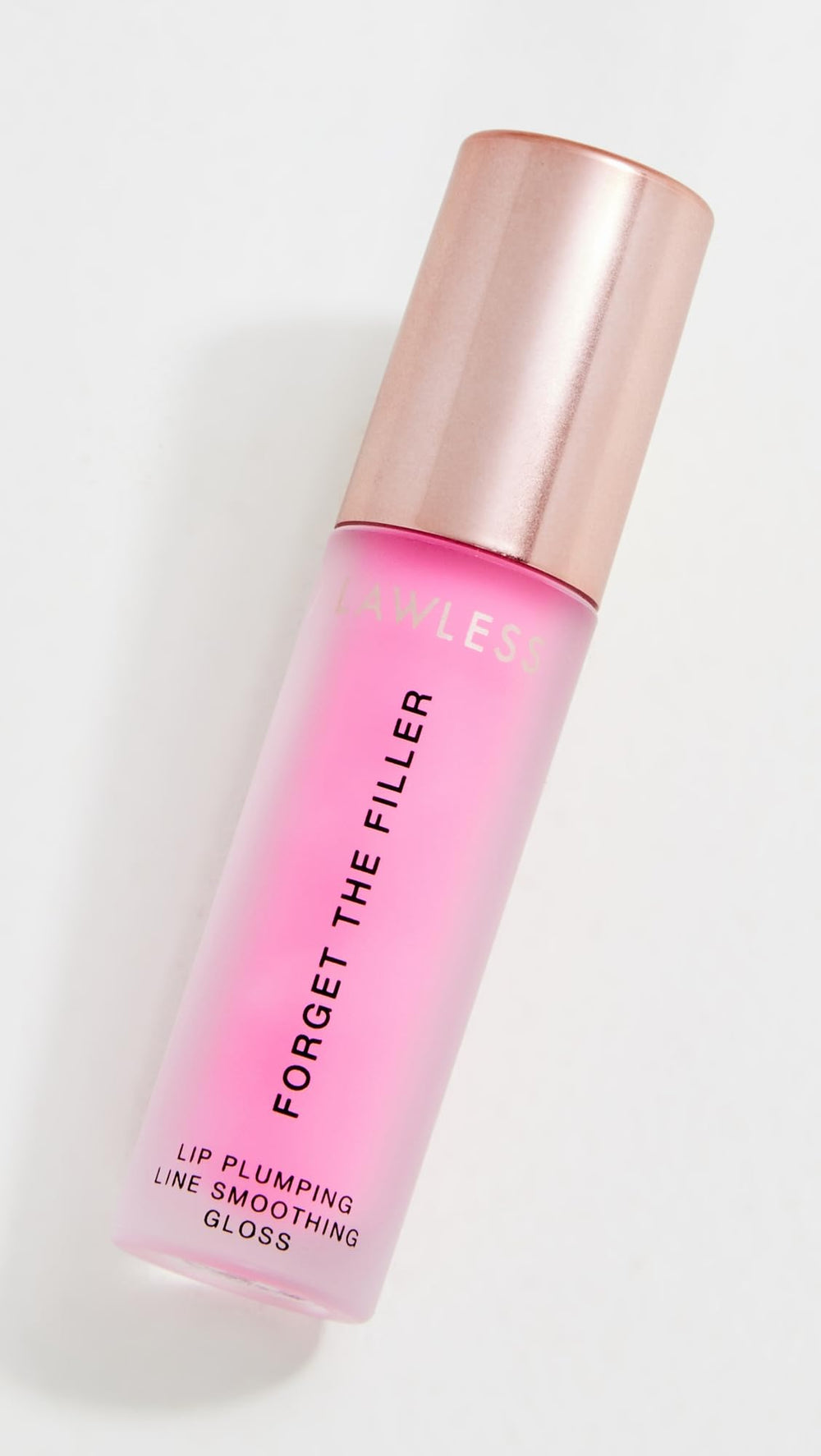 Lawless Forget the Filler Daisy Pink gloss on lips for instant shine and fullness