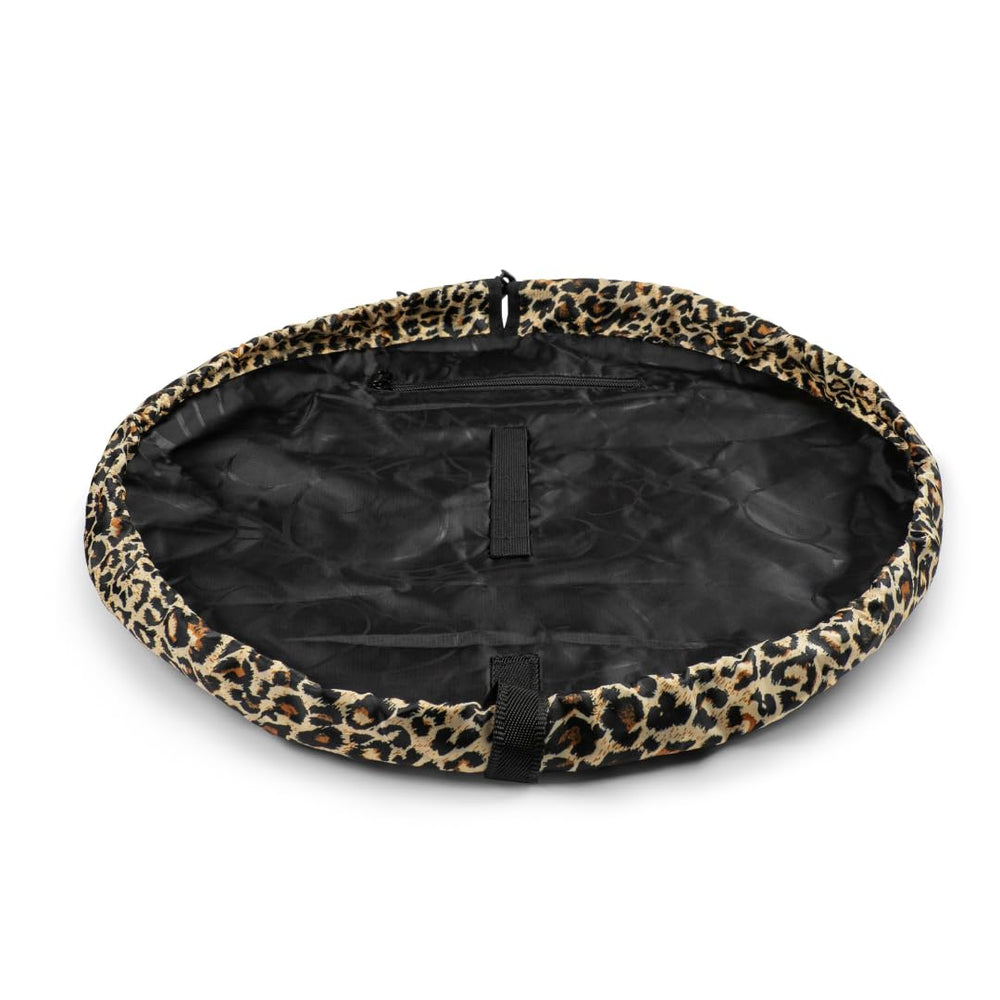 Lay-n-Go Cosmo leopard on hotel counter showcasing compact organization