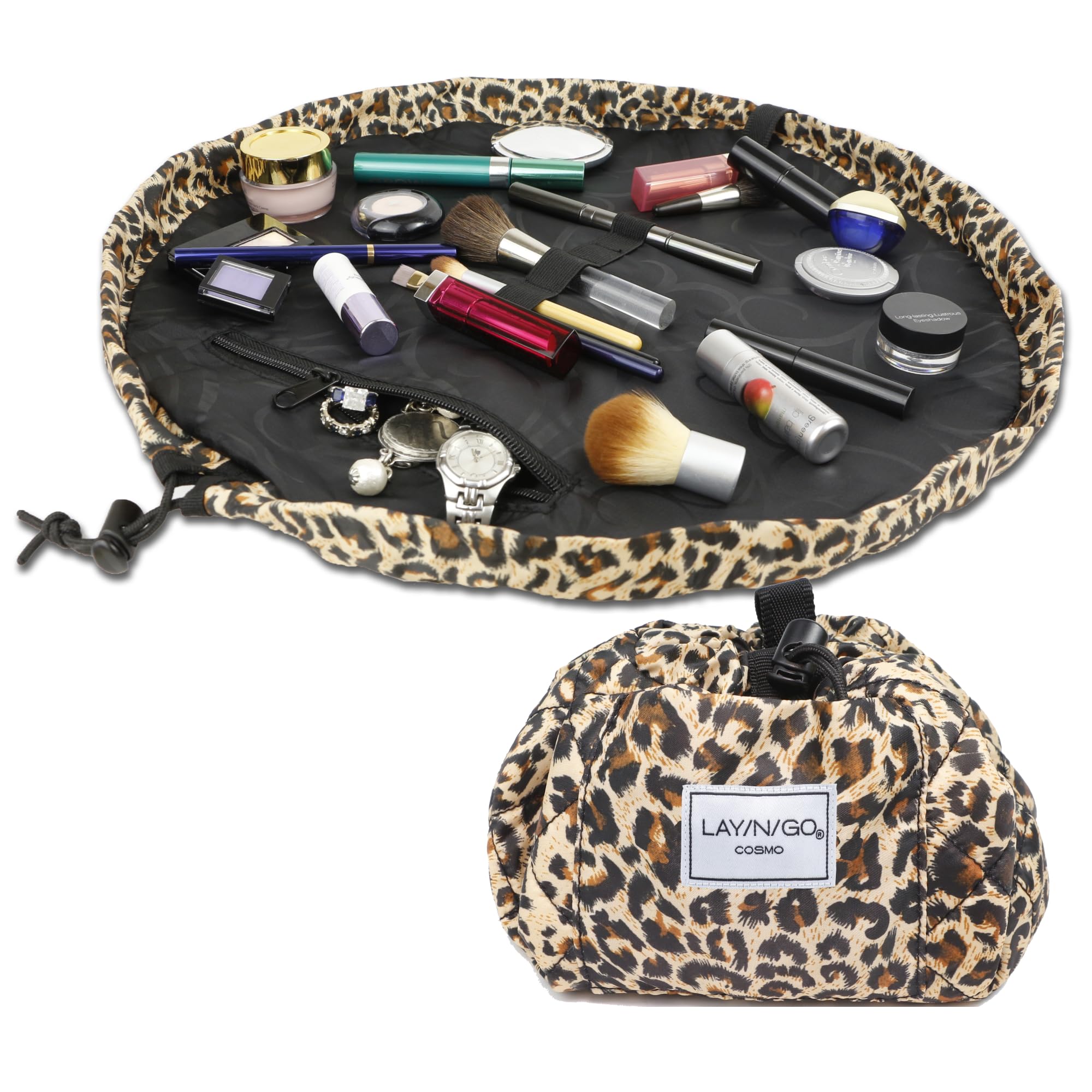 Lay-n-Go Cosmo leopard layflat bag open showing organized makeup on a vanity