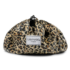 Lay-n-Go Cosmo leopard layflat bag in carry-on for fast access