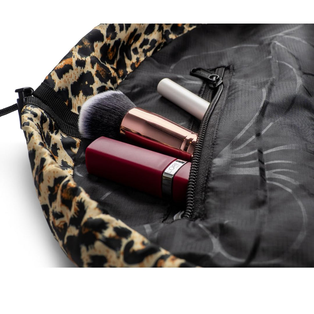 Lay-n-Go Cosmo leopard open to reveal full-size makeup and brushes