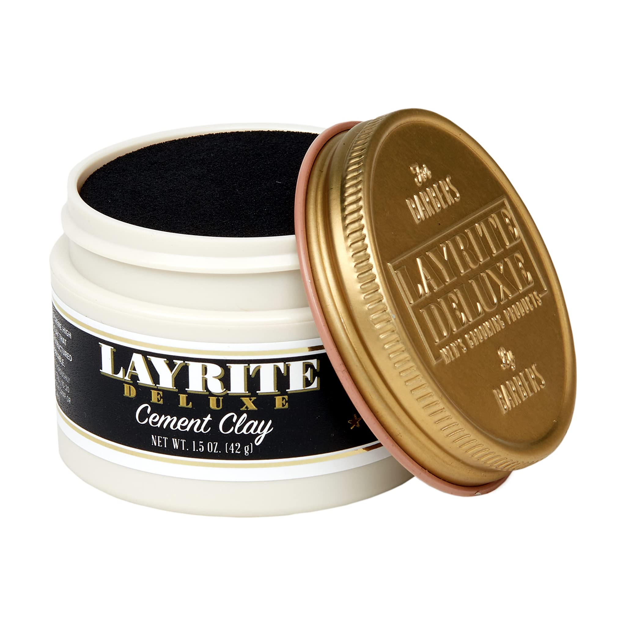 Layrite Deluxe Cement Clay in hands during styling demonstrates strong grip for textured looks.