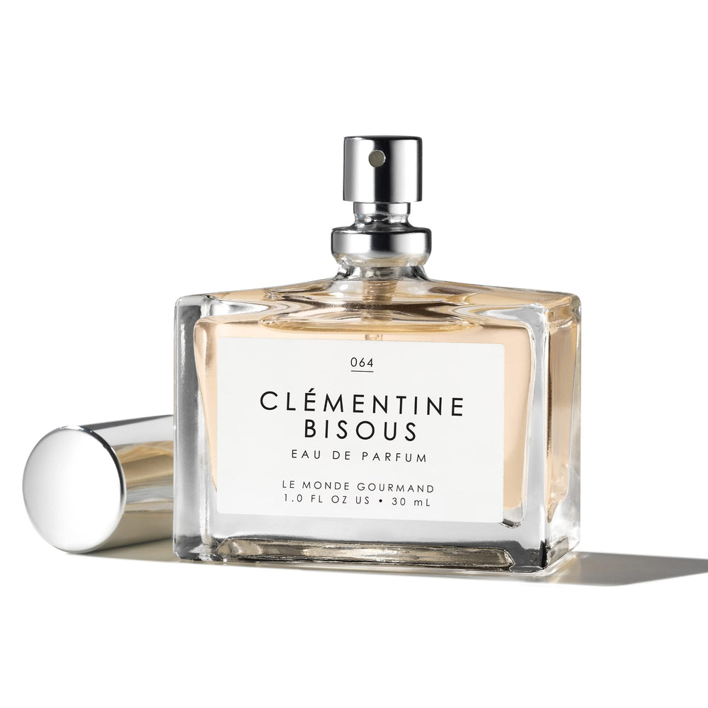 Le Monde Gourmand Clementine Bisous packaging close-up suggests premium presentation.