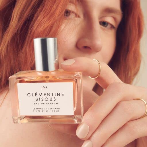 Le Monde Gourmand Clementine Bisous sandalwood note adds warm, lasting depth.