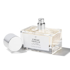 Amber-toned bottle glow evokes cozy mood on vanity.
