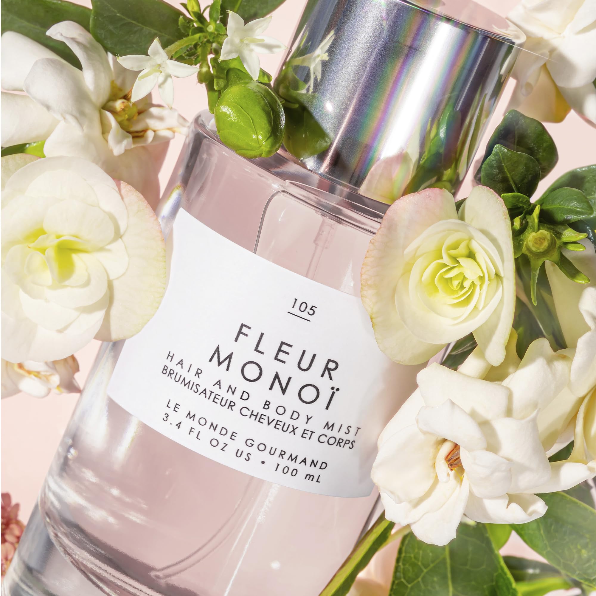 Le Monde Gourmand Fleur Monoi hair application shows airy scent through hair for subtle aroma.