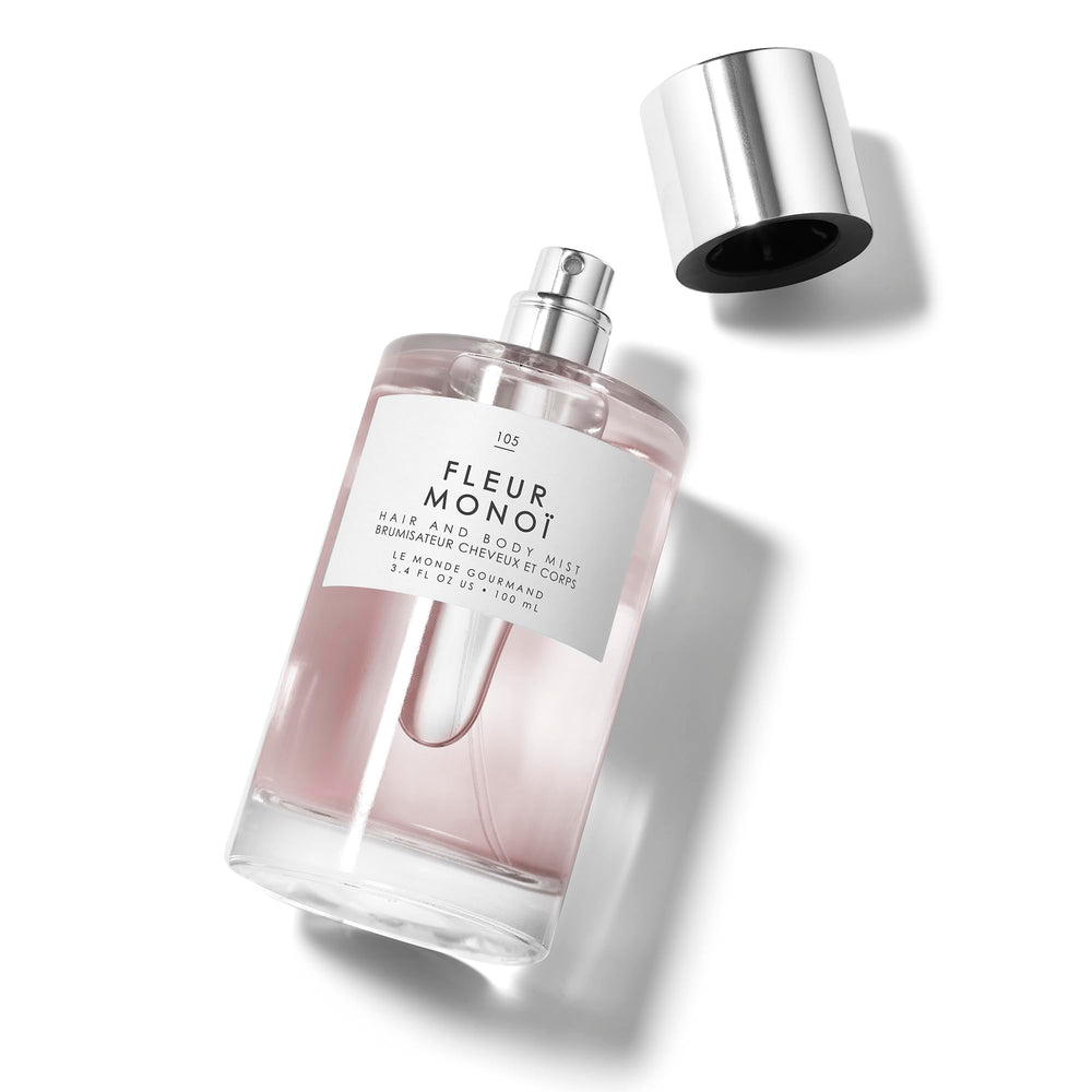 Le Monde Gourmand Fleur Monoi hair brush image highlights how to layer scent through styling.