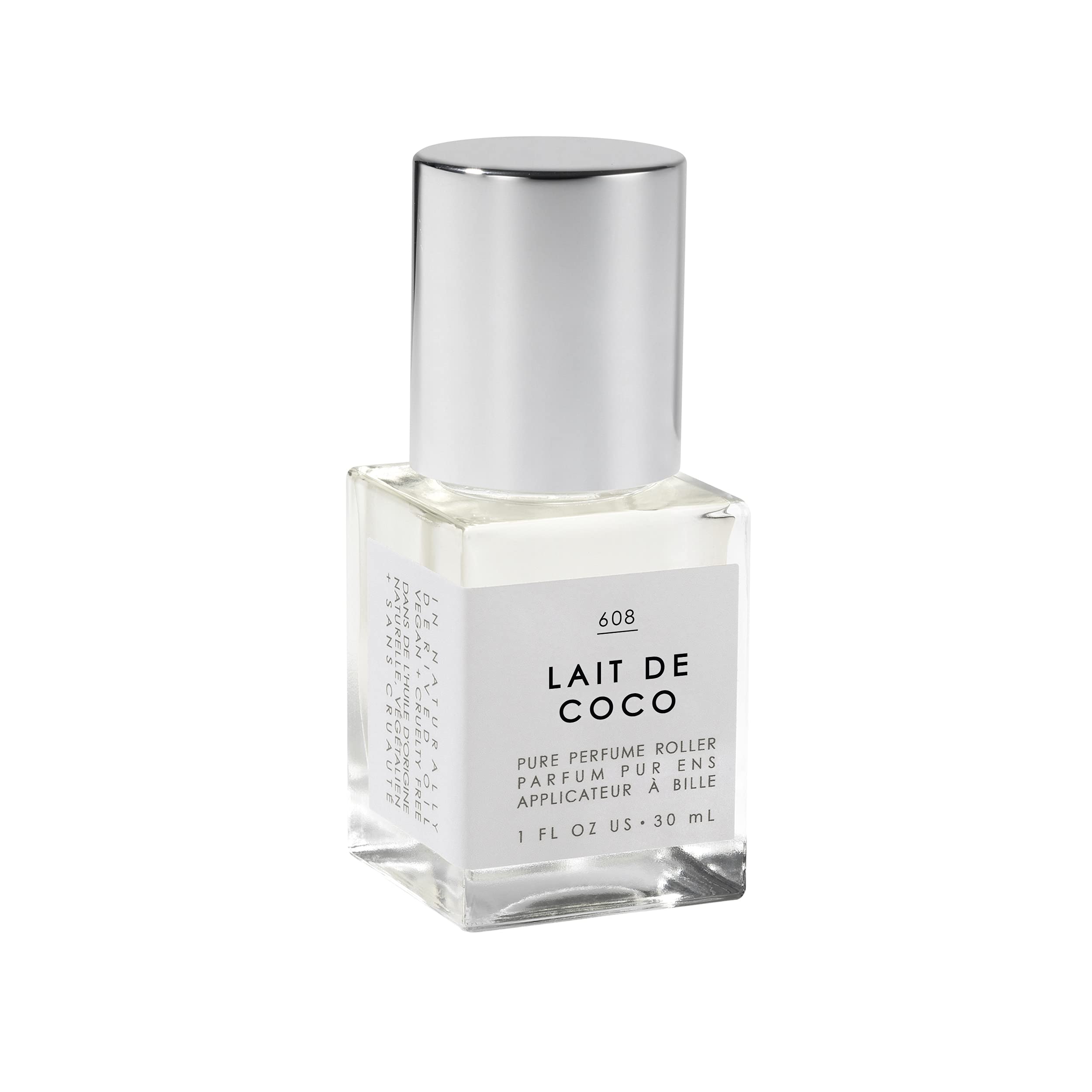 Le Monde Gourmand Lait de Coco perfume oil bottle on vanity shows creamy coconut aroma.