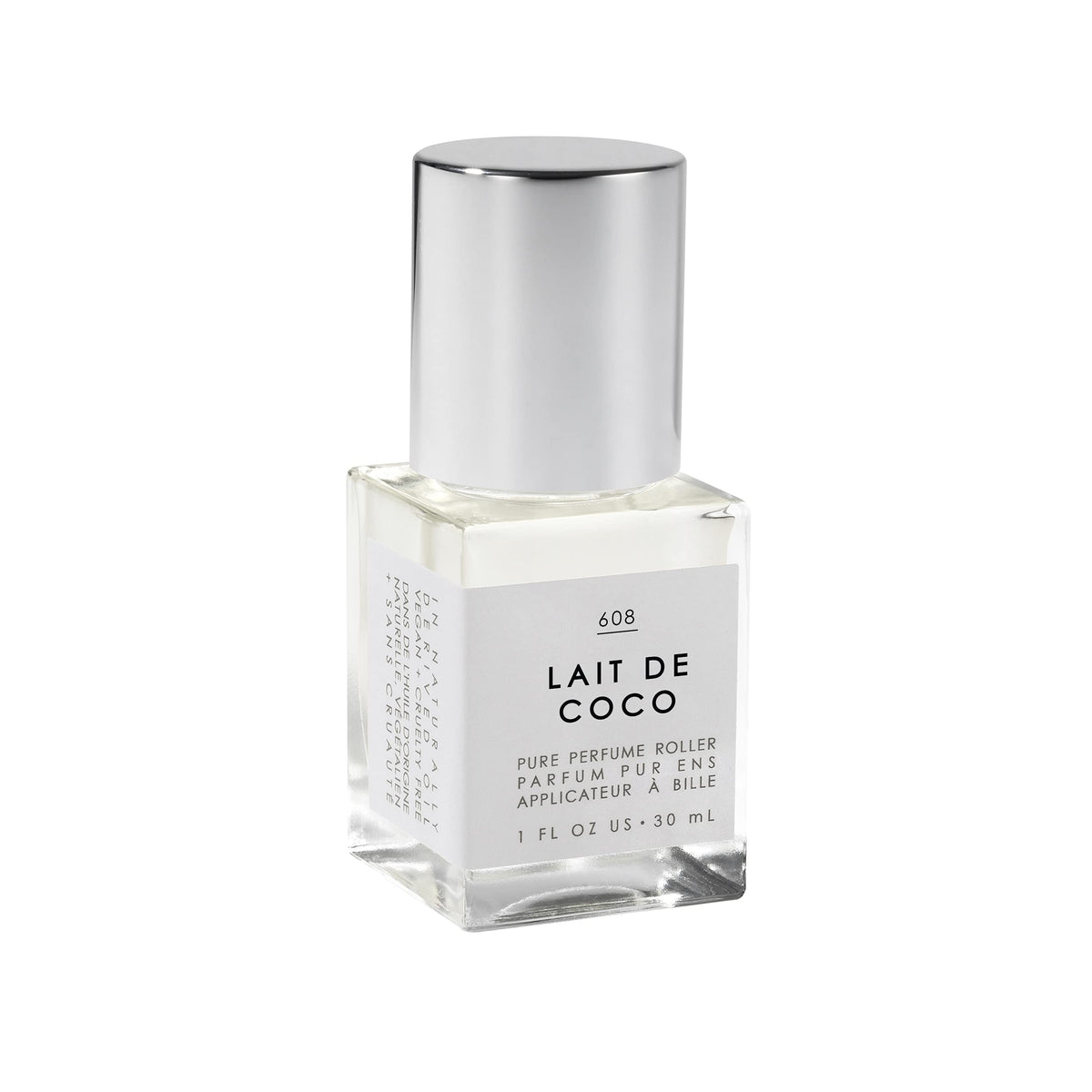 Le Monde Gourmand Lait de Coco perfume oil bottle on vanity shows creamy coconut aroma.