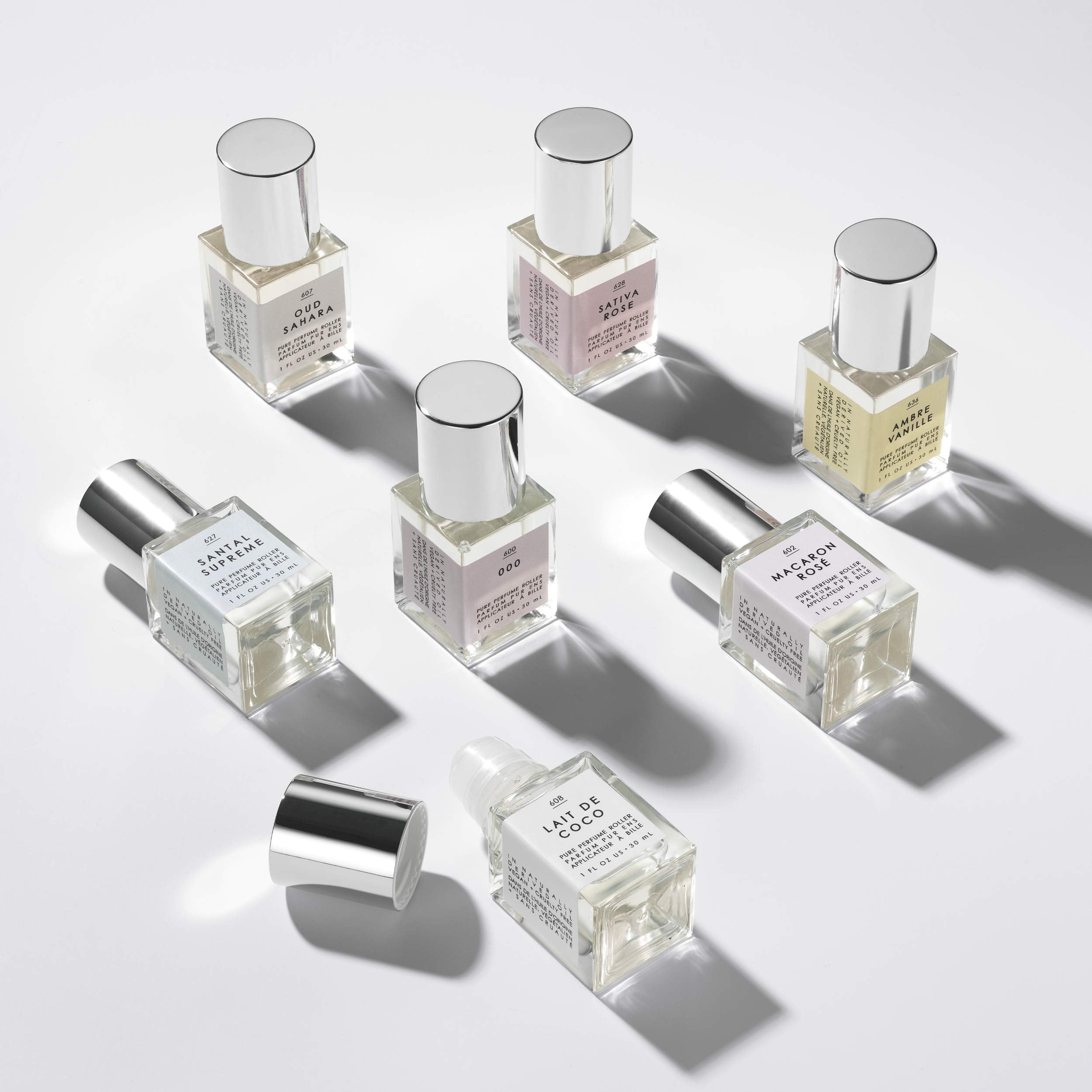 Packaging for Lait de Coco perfume oil emphasizes vegan, cruelty-free formula.