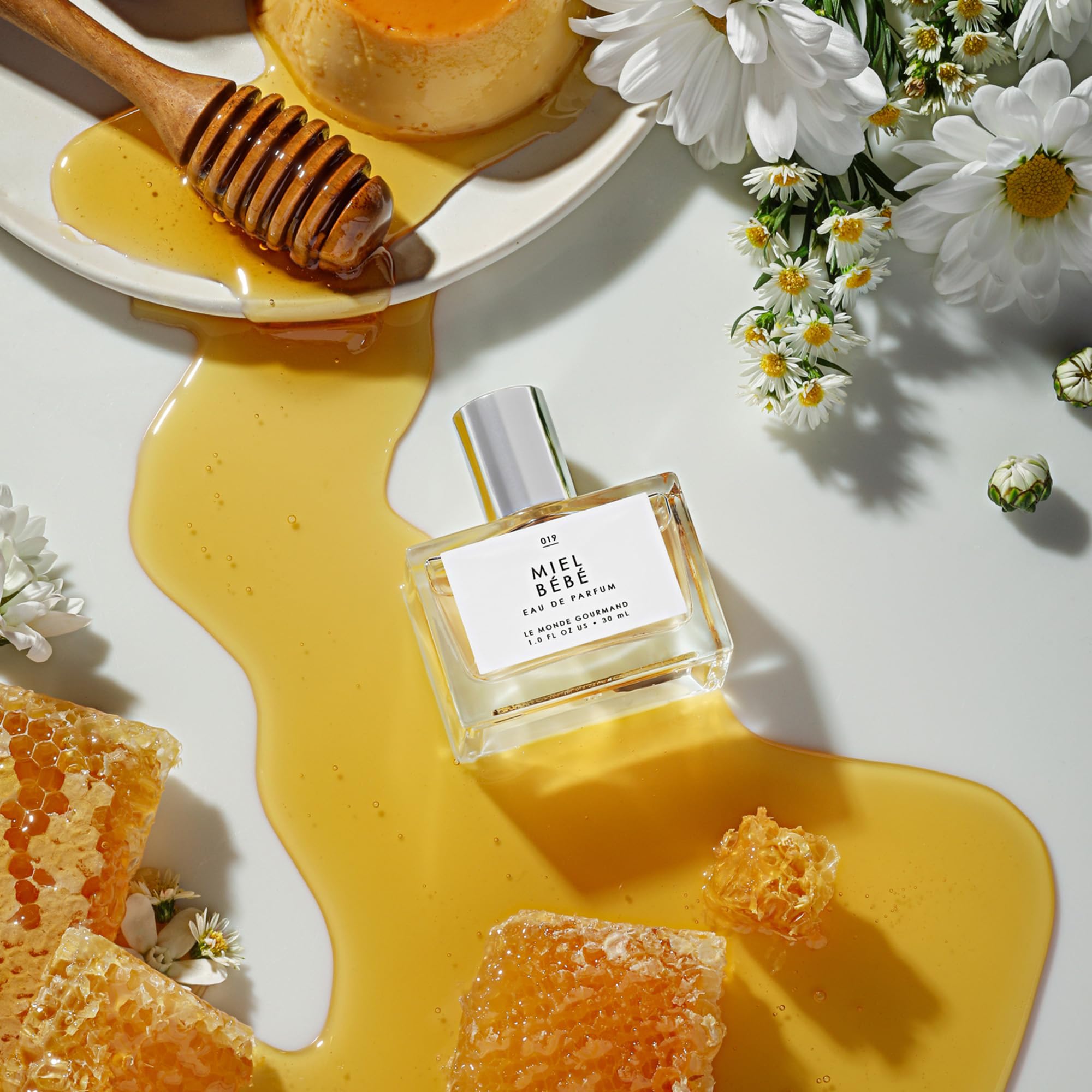 Le Monde Gourmand Miel Bébé floral bouquet image showcases honeyed notes.