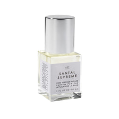 Le Monde Gourmand Santal Supreme bottle on display for a premium woody fragrance.