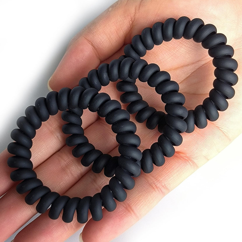 Leenchiry spiral hair ties matte black on ponytail demonstrates durable grip during workouts.