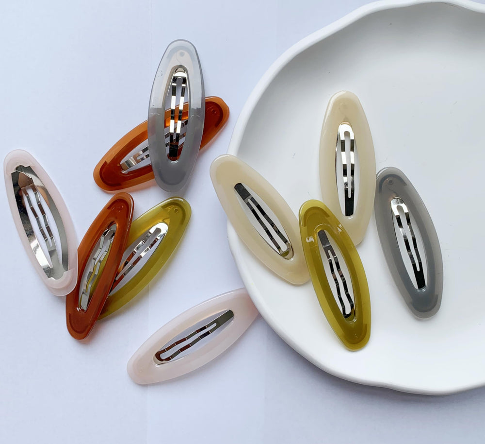 Lemeilleur widened oval clip design grips various hair textures securely.